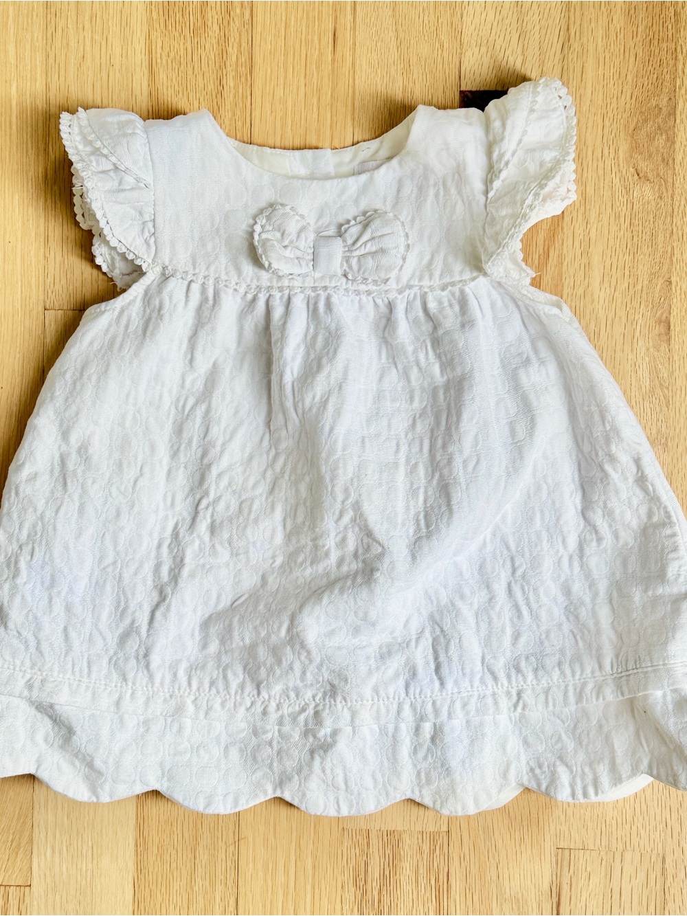 White Baby Eyelet Top with Bow Detail, Cap Sleeves and Scalloped Details, 24m